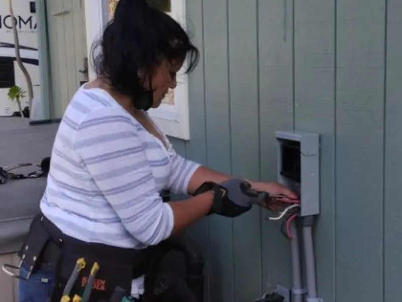 Licensed electrician wiring an exterior subpanel in Lake Goodwin